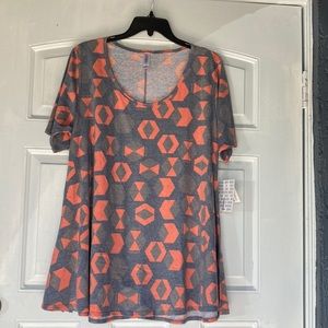 Blouse New.. size large by LuLaRoe. Has slits in the sides
